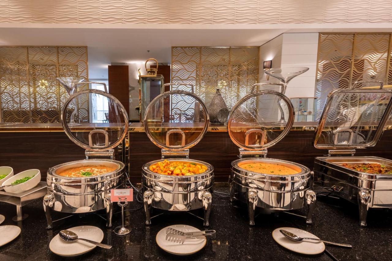 Nivel Hotel Abha Khamis Mushait Exteriör bild A chafing dish