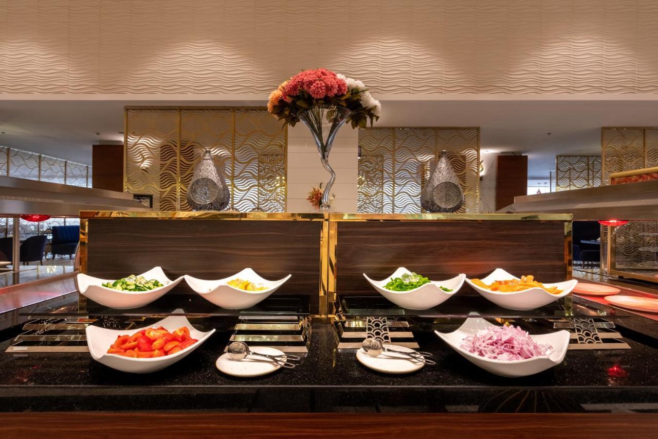 Nivel Hotel Abha Khamis Mushait Exteriör bild A salad bar